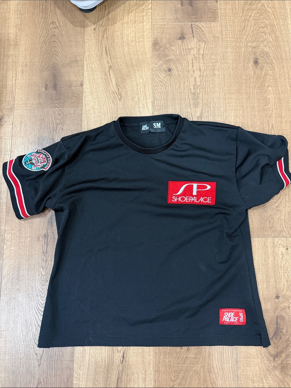 Shoe Palace employee shirt Black Logo Patch Tee